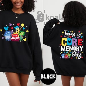 a woman wearing a black sweatshirt with the words today is a gre memory day