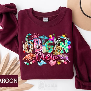 a maroon shirt with the words vegan crew printed on it