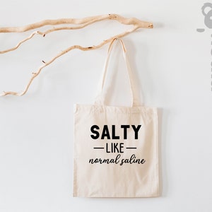 Salty Like Normal Saline, Nurse Tote Bag, Funny Nurse, Nurse Tote Bag, Nurse Tote Bag, Nurse Life, Nurse, Nursing Tote Bag, Nursing Student image 1