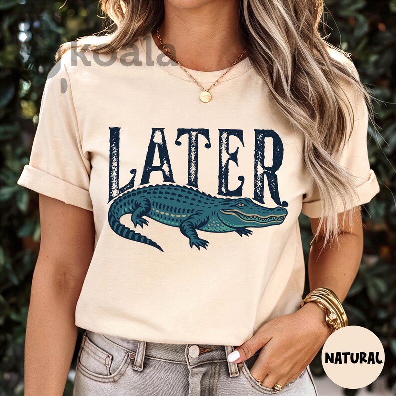 a woman wearing a t - shirt that says later