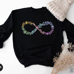 May include: Black sweatshirt with a rainbow floral infinity symbol design.