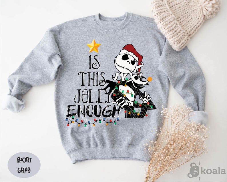 a gray sweater with a skeleton wearing a santa hat