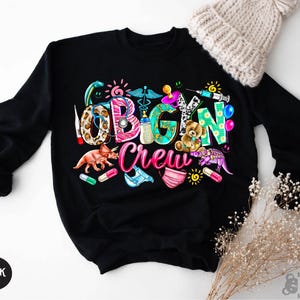 a black sweatshirt with the words vegan crew printed on it