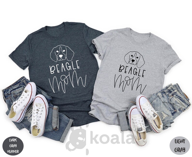 May include: Two t-shirts, one dark heather grey and one light grey, with a beagle silhouette and the text "Beagle Mom" in white.