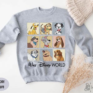 a sweater with a bunch of dogs on it