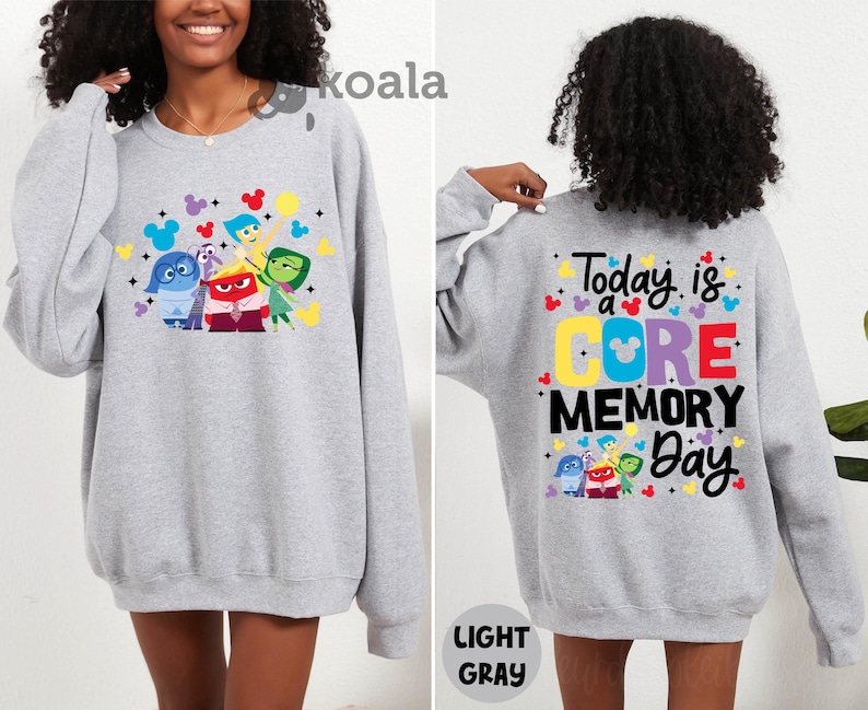 a woman wearing a gray sweatshirt with the words today is a gore memory on it