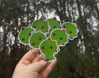 Pride Dino Vinyl Sticker: LGBTQ+ Rainbow Water Bottle Decal