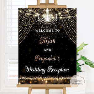 May include: Black wedding reception sign with gold glitter and fairy lights. The sign says "Welcome to Arjun and Priyanka's Wedding Reception".