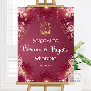Puede incluir: Un cartel de bienvenida de boda con fondo burdeos y detalles dorados. El cartel presenta un diseño floral con flores rosas y rojas. El texto del cartel dice "Bienvenido a Vikram & Payal's Wedding 15th July, 20XX".