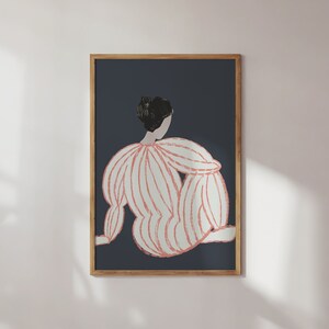 May include: A framed illustration of a person in a pink and white striped shirt, sitting with their back to the viewer against a dark blue background.