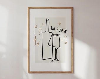 以下が含まれることがあります： ワインボトルとグラスのミニマルな線画が描かれた額装されたプリント。ボトルとグラスの上に「WINE」という文字が手書きのフォントで書かれている。背景は薄いベージュで、金色のアクセントが施されている。