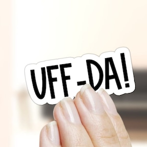 May include: White sticker with black text that reads "UFF-DA!"