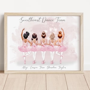 May include: A framed print showing five ballet dancers in pink tutus. The artwork, titled "Sweetheart Dance Team," includes the names Alize, Carson, Tara, Sheridan, and Taylor. The dancers have different hairstyles and skin tones.