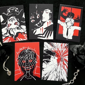 May include: Five art prints with black, white, and red illustrations. The prints depict surreal and horror-themed imagery, including figures with distorted features and ominous scenes. A silver chain and black rose are also visible.