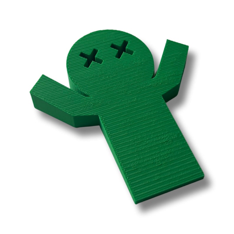 May include: A green 3D printed figurine of a person with their arms raised in the air. The figurine has a round head with two X's for eyes.