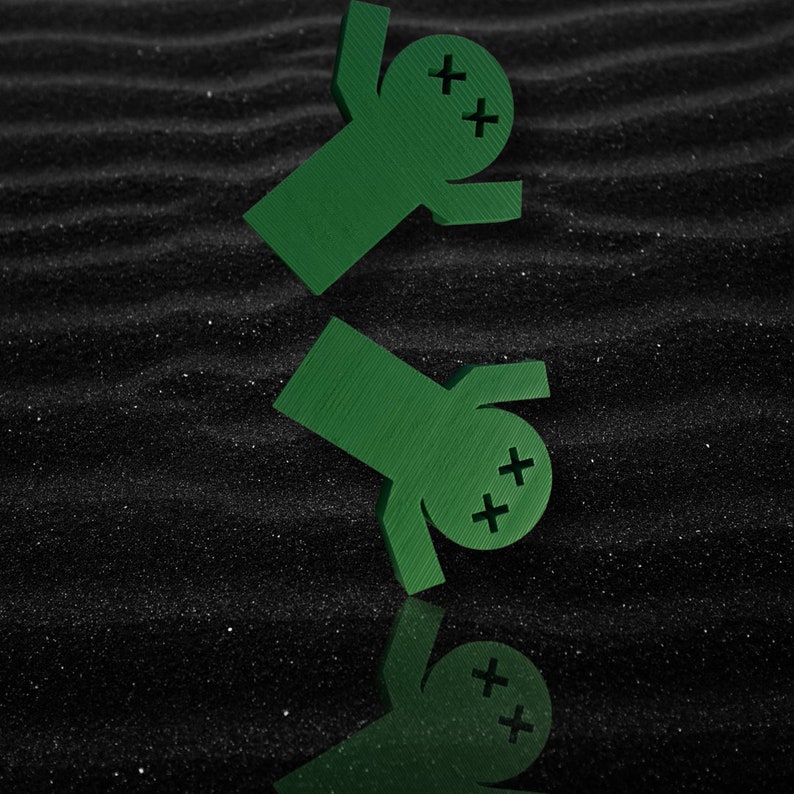 May include: Two green figures with cross-shaped eyes on a black background. The figures are facing each other and appear to be falling.