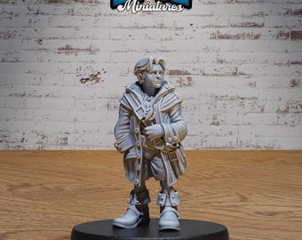 May include: A gray plastic miniature figurine of a young person wearing a long coat, pants, and boots. The figurine is standing on a black base. BASE SIZE: MEDIUM (25.5MM) #5093