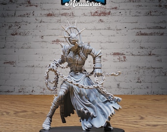 May include: A grey, detailed miniature figure of a creature with a blindfold, chains, and a spiked halo. The figure is standing on a black base with the text "BASE SIZE: MEDIUM (25.5MM)" and "#4294".