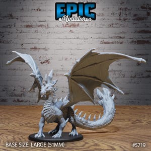 May include: A detailed, unpainted miniature dragon figure with large wings, spiky protrusions, and a long tail. The base size is large, 51mm. The Epic Miniatures logo is visible in the top left corner.