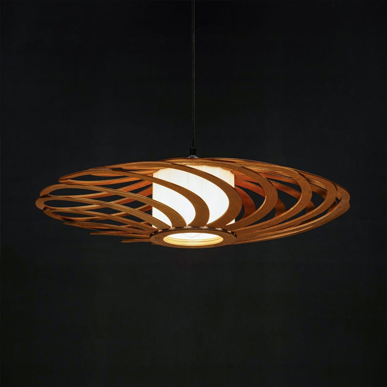 Handmade wooden pendant light with a unique laser-cut plywood design. Modern Scandinavian ceiling lamp for cozy interiors. Eco-friendly and stylish chandelier for dining room, bedroom, or living space.
