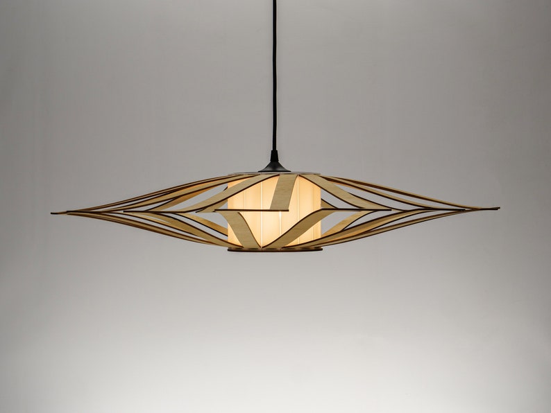 Handcrafted mid-century wooden ceiling light featuring an open-frame structure. A statement piece for dining rooms, bedrooms, or modern living spaces.