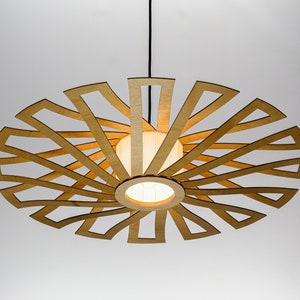 Elegant wooden pendant light with a unique, nature-inspired structure. Ideal for contemporary interiors, creating a warm and cozy ambiance in any space.