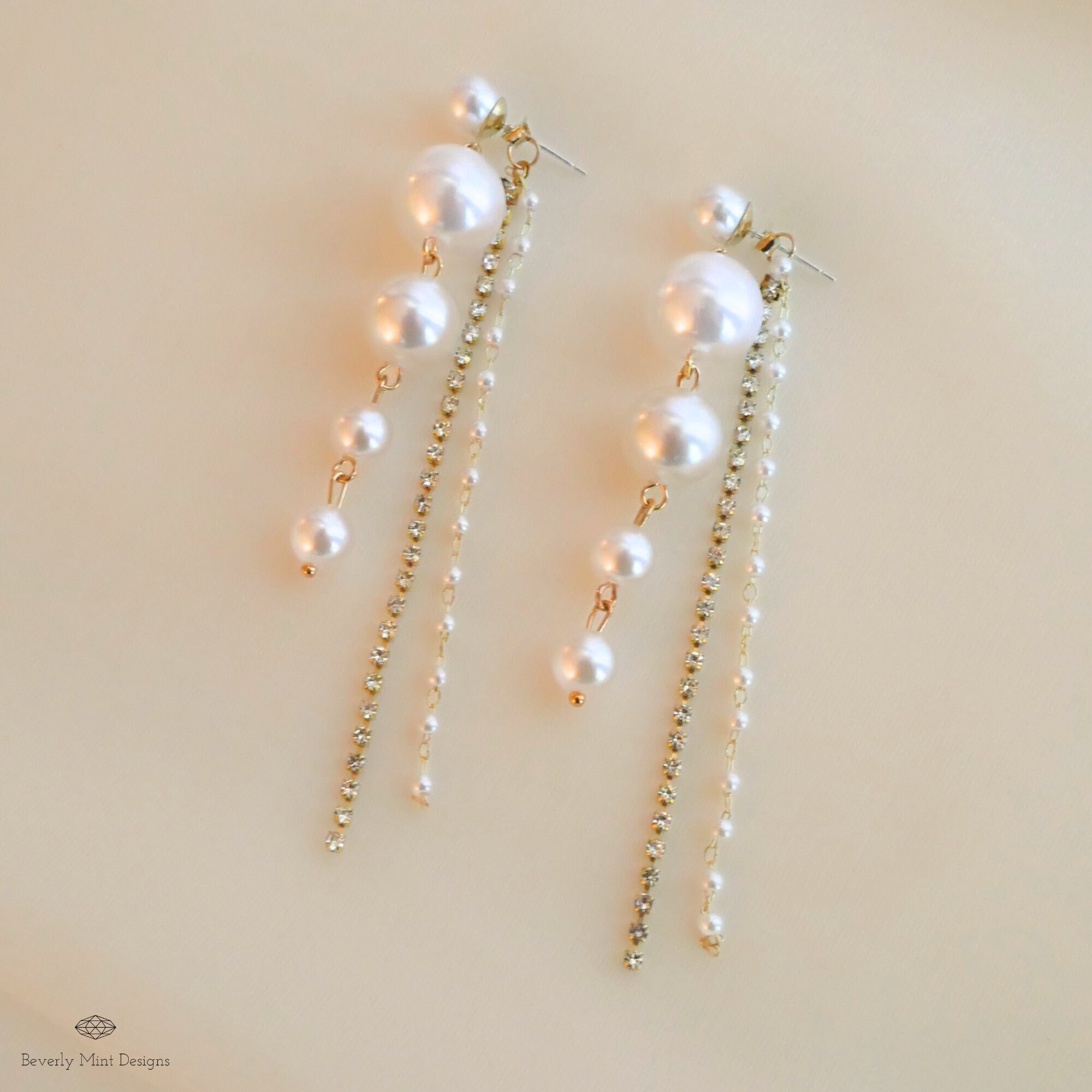 Dangling pearl deals
