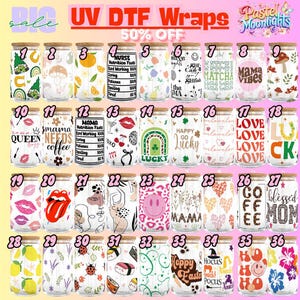 May include: A collection of glass can-shaped tumblers with bamboo lids, featuring various UV DTF wrap designs. Designs include text, patterns, and graphics such as lips, smiley faces, and floral motifs. The text "UV DTF Wraps 50% OFF" is visible.