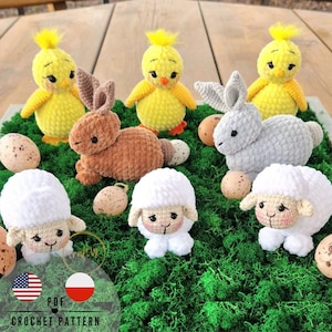 May include: A collection of crocheted Easter animals, including a brown bunny, a gray bunny, two white lambs, and three yellow chicks. The animals are arranged on a bed of green moss with speckled eggs scattered around them. The image includes the text "PDF CROCHET PATTERN" and flags for the United States and Poland.