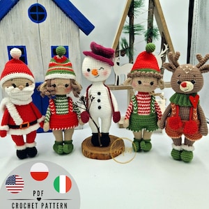 May include: Crochet amigurumi Christmas ornaments, including a snowman, Santa Claus, elf, and reindeer. The ornaments are made with red, green, white, and brown yarn.