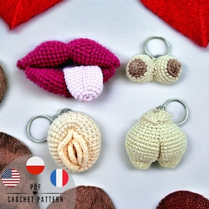 May include: A collection of handmade crochet keychains in various shapes, including a pair of lips with a tongue, breasts, a vulva, and a pair of testicles. The keychains are in shades of pink, beige, and brown. The text "PDF CROCHET PATTERN" is also visible.