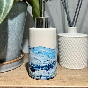 Hand painted ceramic Ocean soap dispenser, round, inspired by Cornish ocean waves. Add 'Happiness comes in waves' quote. Refillable.