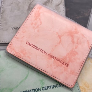 Bi fold vaccination card holder