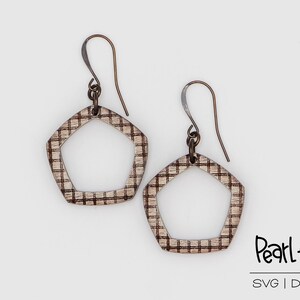 May include: A pair of geometric earrings with a pentagon shape. The earrings have a textured, light-colored surface with a dark grid pattern. The ear wires are a dark bronze color. The logo "Pearl + Peg" is in the bottom right corner.