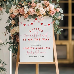 Panneau de bienvenue pour baby shower « Un petit cœur est en route » | Baby shower pour la Saint-Valentin | Shower de bébé à thème coeur | Téléchargement numérique sur toile | NB08