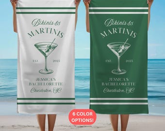 May include: Two white beach towels with green text and a green martini glass graphic. The text reads "Bikinis & Martinis" and "Jessica's Bachelorette Charleston, SC".