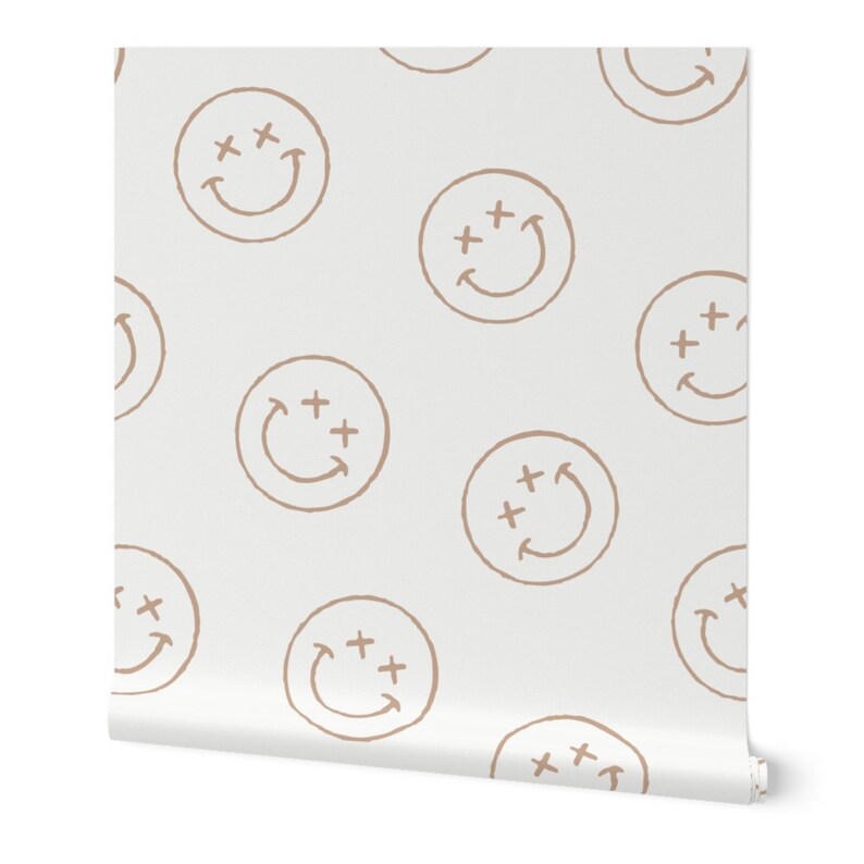 May include: A seamless pattern featuring a light brown smiley face with two plus signs and an arrow on a white background.
