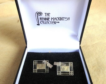 Silver cufflinks in original box. Rennie Mackintosh collection, Glasgow, Scotland.