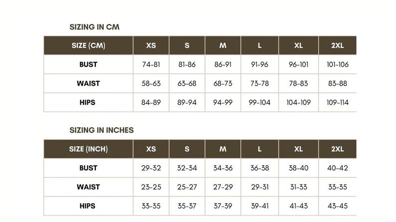 May include: A size chart in a table format, with measurements in centimeters and inches. The chart includes bust, waist, and hip measurements for sizes XS to 2XL. The text "SIZING IN CM" and "SIZING IN INCHES" are at the top.