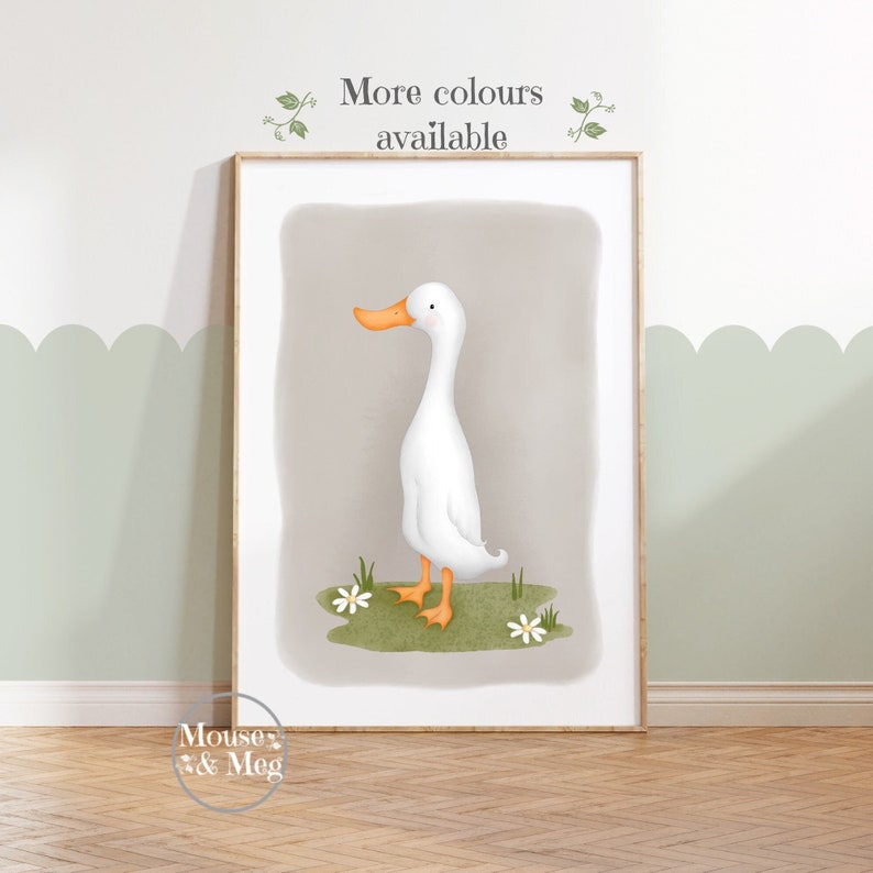 May include: A white duck with an orange beak standing on a green patch of grass with white flowers. The background is a light brown color. The text "More colours available" is at the top of the image.