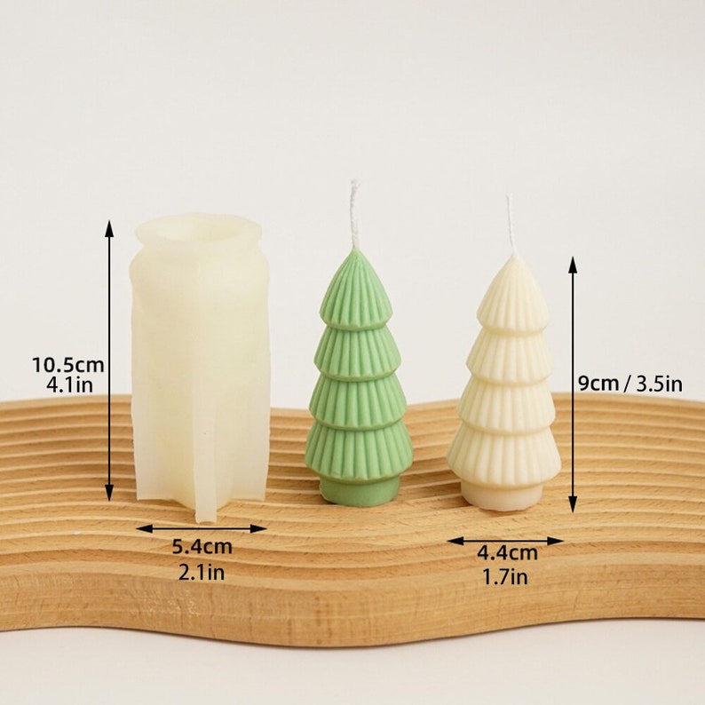 May include: Three Christmas tree candles, one green and two white, with a silicone mold for making the candles. The candles are 4.4 inches tall and the mold is 4.1 inches tall.
