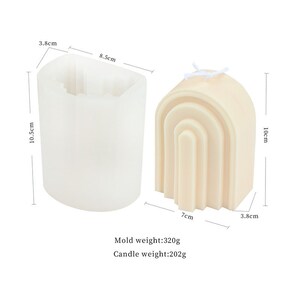 May include: A white silicone mould for making a candle shaped like an archway. The mould is 8.5 cm wide, 10.5 cm tall, and 3.8 cm deep. The finished candle is 7 cm wide, 10 cm tall, and 3.8 cm deep. Mould weight: 320g. Candle weight: 202g.