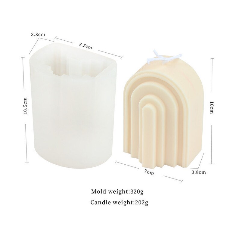 May include: A white silicone mould for making a candle shaped like an archway. The mould is 8.5 cm wide, 10.5 cm tall, and 3.8 cm deep. The finished candle is 7 cm wide, 10 cm tall, and 3.8 cm deep. Mould weight: 320g. Candle weight: 202g.