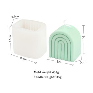 May include: A white silicone mould for making a rainbow-shaped candle. The mould is 8.5 cm tall, 10.5 cm wide, and 9.5 cm deep. The finished candle is 9 cm tall, 8 cm wide, and 6 cm deep. Mould weight: 431g. Candle weight: 315g.