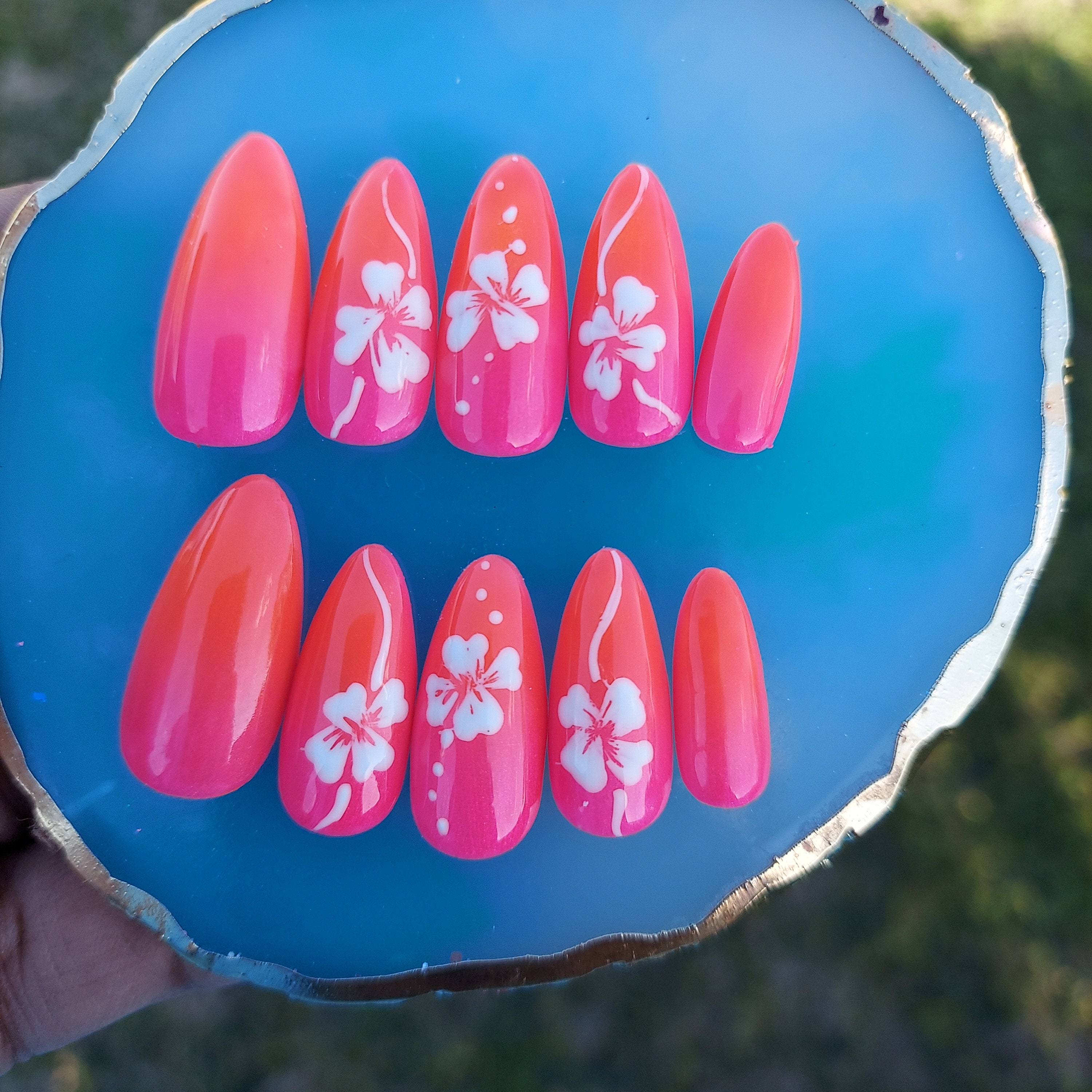 Tropical Sunburst Nails with Coral Glow