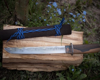 Hand forged knife with hamon