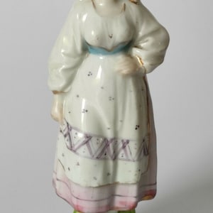 Antique Russian porcelain figure in traditional costume  - late 19th century