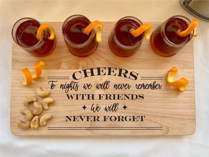 Handmade whiskey or tequila shot board, Custom engraved with quote Cheers to the nights we will never remember with friends we will never forget!  Perfect for customizing a home bar or man cave, great personalized engagement gift or wedding gift.