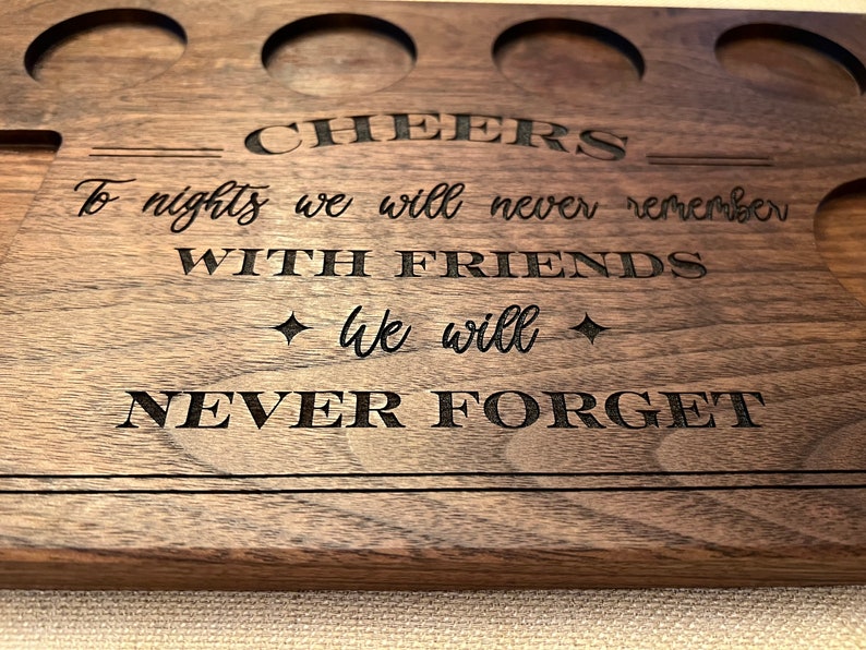 Walnut hardwood tequila shot flight board, handmade.  Cheers to friends we will never forget. This minimalist wood shot board is a great gift for someone who enjoys unique details of walnut and a quality handcrafted and personalized tequila bar gift.