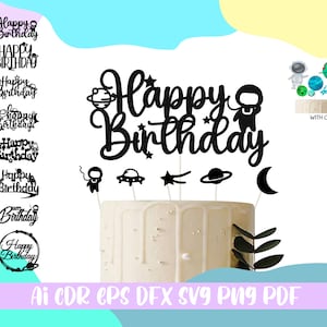 Puede incluir: Silueta en blanco y negro de un adorno para pastel con el texto "Happy Birthday" y elementos espaciales como estrellas, un cohete, un planeta y una luna creciente. El texto "With Gift" también es visible en la imagen.